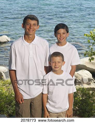 Portrait of three brothers; lake tahoe california united states of america View Large Photo Image Stock Image - Portrait of three brothers; lake tahoe california united states of america. Fotosearch