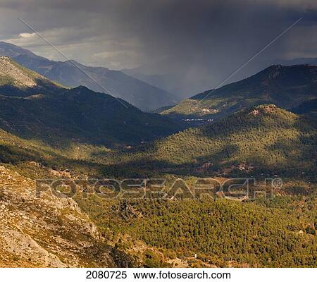 Rain storm approaching puerto de las palomas in cazorla natural park; segura y las villas jaen province andalusia spain View Large Photo Image Stock Photography - Rain storm approaching puerto de las palomas in cazorla natural park; segura y las villas jaen province andalusia spain. Fotosearch