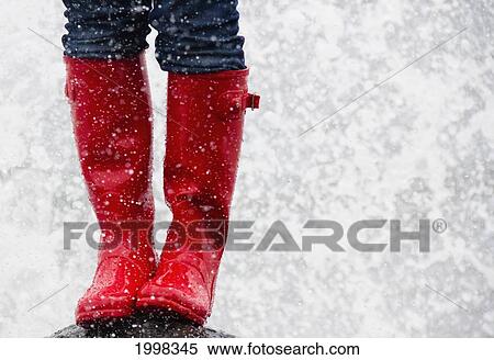 Stock Photography - Red Rubber Boots In The Rain; Tofino British Columbia Canada. Fotosearch