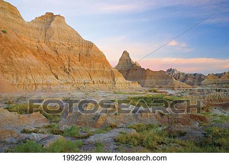 Stock Photo - Red Sunrise On The Hills Of Badlands National Park; South Dakota United States Of America. Fotosearch