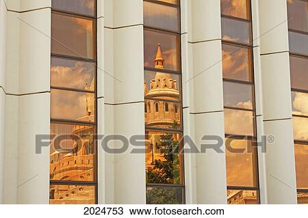Stock Image - Reflection Of Fisherman's Bastion In A Window In The Castle District Of Budapest; Budapest Hungary. Fotosearch