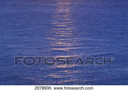 Reflection of sunlight on the sea; caba de gata almeria province spain View Large Photo Image Stock Photography - Reflection of sunlight on the sea; caba de gata almeria province spain. Fotosearch