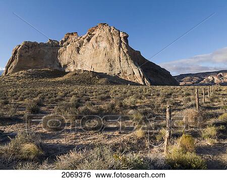 Rock Cliffs Against A Blue Sky In Glen Canyon National Recreation Area; Utah United States Of America View Large Photo Image Stock Photograph - Rock Cliffs Against A Blue Sky In Glen Canyon National Recreation Area; Utah United States Of America. Fotosearch