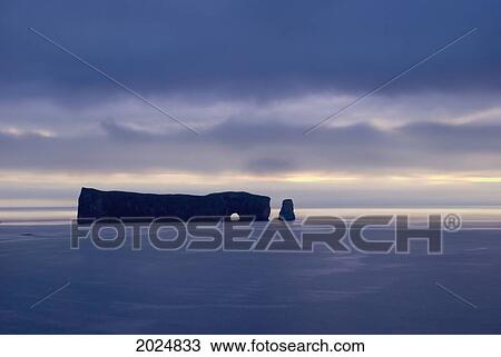 Rock Formation Perce Rock In The Water In Shades Of Blue; Perce Quebec Canada View Large Photo Image Stock Image - Rock Formation Perce Rock In The Water In Shades Of Blue; Perce Quebec Canada. Fotosearch