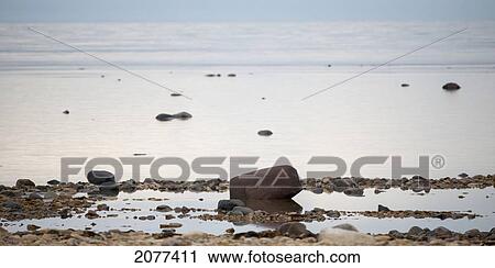 Rocks on the shore and a seascape of hudson bay; churchill manitoba canada View Large Photo Image Stock Image - Rocks on the shore and a seascape of hudson bay; churchill manitoba canada. Fotosearch