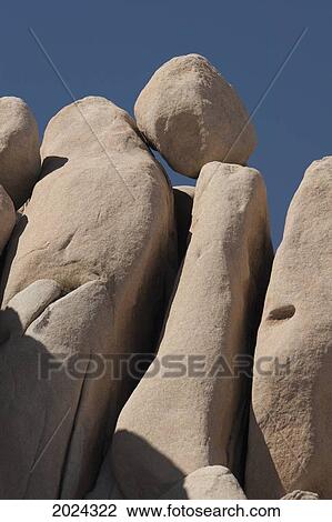 Round Boulder On Top Of Rounded Rock Cliff And Blue Sky; Palm Springs California United States Of America View Large Photo Image Stock Image - Round Boulder On Top Of Rounded Rock Cliff And Blue Sky; Palm Springs California United States Of America. Fotosearch