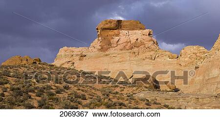 Stock Photo - Rugged Rock Formation And Cliffs On A Desert Landscape; Utah United States Of America. Fotosearch
