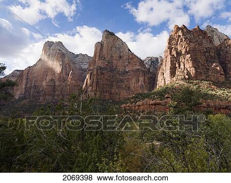 Rugged Sandstone Cliffs In Zion National Park; Utah United States Of America View Large Photo Image Stock Photo - Rugged Sandstone Cliffs In Zion National Park; Utah United States Of America. Fotosearch
