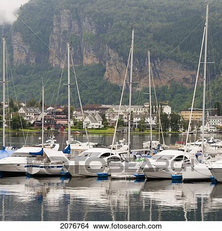 Sailboats in the harbour of hardangerfjord; hardangervidda norway View Large Photo Image Picture - Sailboats in the harbour of hardangerfjord; hardangervidda norway. Fotosearch