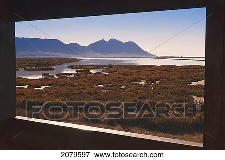 Stock Photo - Saltflats of the cabo de gata natural park seen from the public birdwatching hide; almeria province spain. Fotosearch