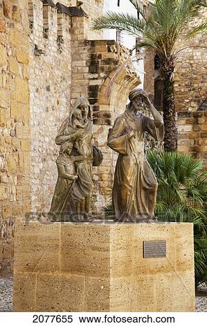 Stock Photography - Sculptures at the old town wall; antequera andalucia spain. Fotosearch