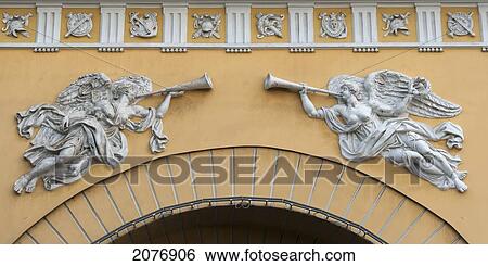 Sculptures of angels blowing horns above an archway on a building; st. petersburg russia View Large Photo Image Stock Photograph - Sculptures of angels blowing horns above an archway on a building; st. petersburg russia. Fotosearch