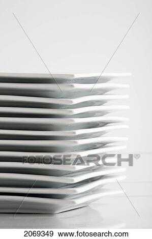 Stack Of White Square Plates On A White Background View Large Photo Image Stock Photo - Stack Of White Square Plates On A White Background. Fotosearch