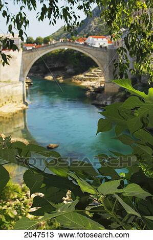 Stock Image - Stari Most Or Old Town Bridge Over The River Neretva; Mostar Muslim-Croat Federation Bosnia And Hercegovina. Fotosearch