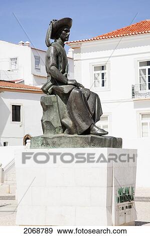 Statue Of A Man Seated On A Stone; Lagos Algarve Portugal View Large Photo Image Stock Photo - Statue Of A Man Seated On A Stone; Lagos Algarve Portugal. Fotosearch