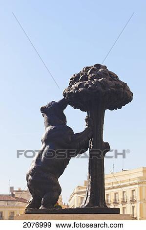 Stock Photo - Statue of bear and strawberry tree from madrid's coat of arms; madrid spain. Fotosearch
