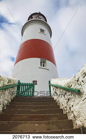 Steps leading up to a red and white lighthouse; south shields tyne and wear england View Large Photo Image Stock Image - Steps leading up to a red and white lighthouse; south shields tyne and wear england. Fotosearch