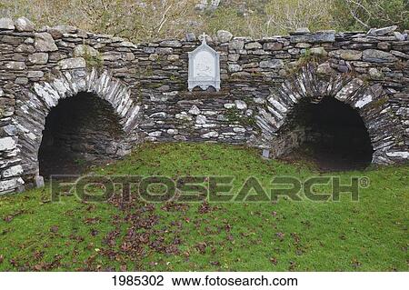 Stock Image - Stone Cells On The Site Of St. Finbarr's 6Th Century Hermitage In Gougane Barra Forest Park; County Cork Republic Of Ireland. Fotosearch