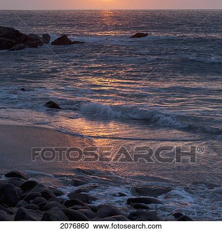 Sunlight reflecting on the ocean at sunset; sayulita mexico View Large Photo Image Stock Image - Sunlight reflecting on the ocean at sunset; sayulita mexico. Fotosearch