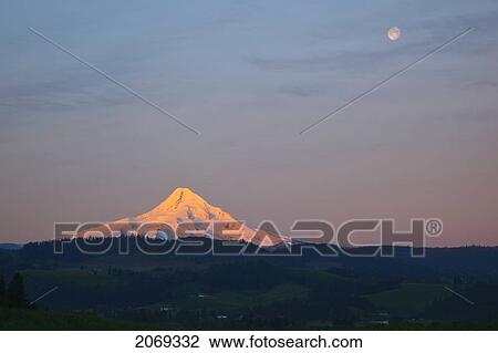 Sunrise Over Mount Hood With The Moon In The Sky; Oregon United States Of America View Large Photo Image Stock Image - Sunrise Over Mount Hood With The Moon In The Sky; Oregon United States Of America. Fotosearch
