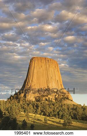 Stock Image - Sunset On Devils Tower; Wyoming United States Of America. Fotosearch