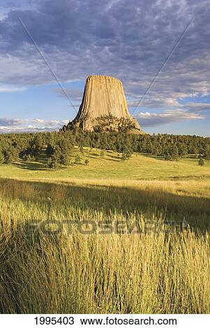 Stock Image - Sunset On Devils Tower; Wyoming United States Of America. Fotosearch