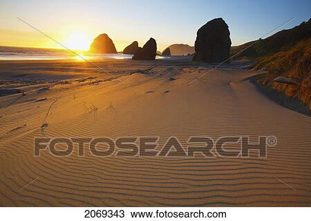 Sunset Over Rock Formations At Cape Sebastian Park; Oregon United States Of America View Large Photo Image Stock Image - Sunset Over Rock Formations At Cape Sebastian Park; Oregon United States Of America. Fotosearch
