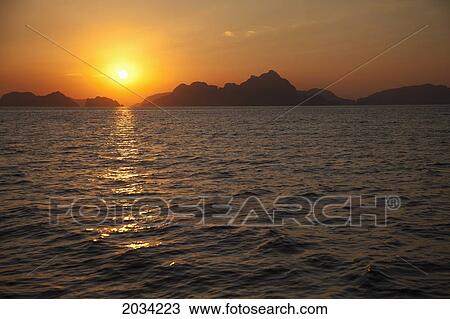 Sunset Over The Mountainous Coast; Corong Corong Bacuit Archipelago Palawan Philippines View Large Photo Image Stock Image - Sunset Over The Mountainous Coast; Corong Corong Bacuit Archipelago Palawan Philippines. Fotosearch