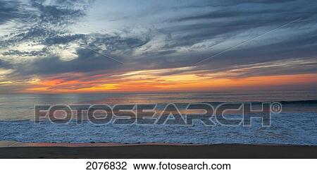 Stock Image - Sunset over the ocean; sayulita mexico. Fotosearch