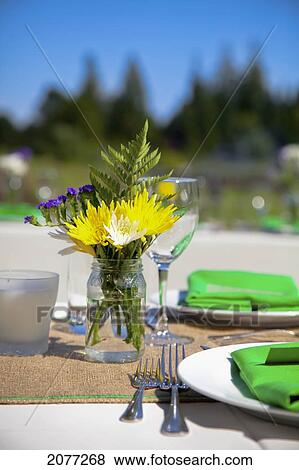 Tableware and flowers set for sunny outdoor wedding; vancouver british columbia canada View Large Photo Image Stock Photo - Tableware and flowers set for sunny outdoor wedding; vancouver british columbia canada. Fotosearch