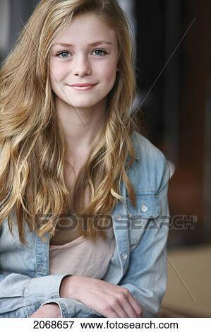 Teenage Girl With Long Blond Hair And Blue Eyes; Troutdale Oregon United States Of America View Large Photo Image Stock Photo - Teenage Girl With Long Blond Hair And Blue Eyes; Troutdale Oregon United States Of America. Fotosearch