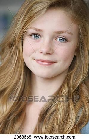 Stock Photo - Teenage Girl With Long Blond Hair And Blue Eyes; Troutdale Oregon United States Of America. Fotosearch