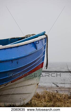 The bow of a wooden boat painted various colours; boulmer northumberland england View Large Photo Image Stock Photography - The bow of a wooden boat painted various colours; boulmer northumberland england. Fotosearch