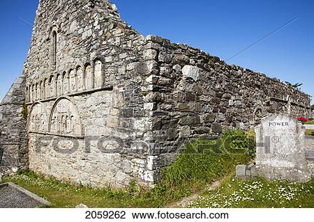 Stock Image - The Cathedral And Tombstones In The Cemetery; Ardmore County Waterford Ireland. Fotosearch