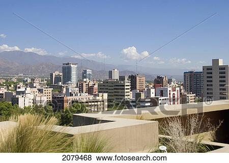 Stock Photo - The city of mendoza viewed from a rooftop terrace; mendoza argentina. Fotosearch