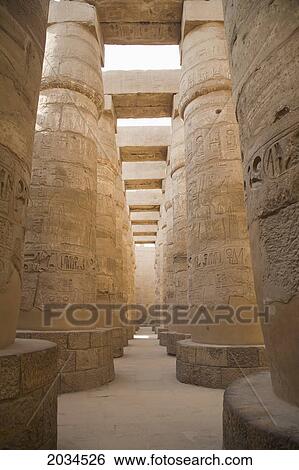The Massive Columns In The Temples Of Karnak On The East Bank Of Luxor Along The Nile River; Luxor Egypt View Large Photo Image Stock Photograph - The Massive Columns In The Temples Of Karnak On The East Bank Of Luxor Along The Nile River; Luxor Egypt. Fotosearch