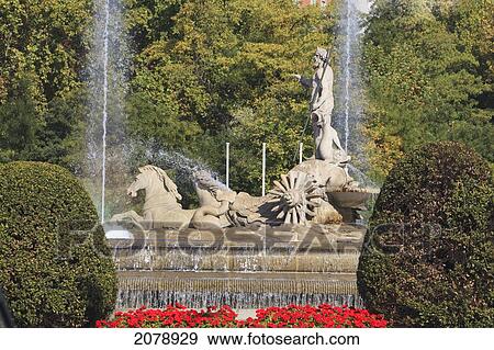 The neptune fountain in plaza de canovas del castillo; madrid spain View Large Photo Image Stock Photo - The neptune fountain in plaza de canovas del castillo; madrid spain. Fotosearch