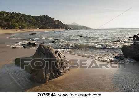 Tide washing up on the shore; sayulita mexico View Large Photo Image Picture - Tide washing up on the shore; sayulita mexico. Fotosearch