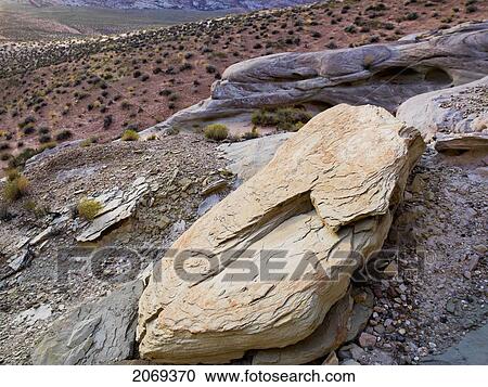 Stock Image - Various Rocks On A Desert Landscape; Utah United States Of America. Fotosearch
