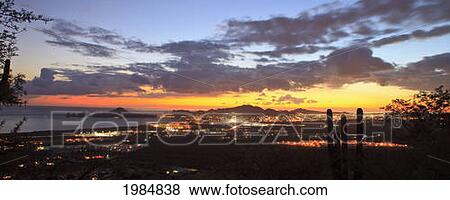 View Of Cabo San Lucas At Sunset; Cabo San Lucas Baja California Sur Mexico View Large Photo Image Stock Photo - View Of Cabo San Lucas At Sunset; Cabo San Lucas Baja California Sur Mexico. Fotosearch