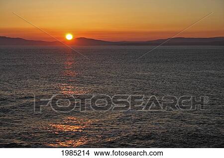 Picture - View Of Sunset From Rossbeigh Beach On The Iveragh Peninsula Or Ring Of Kerry; County Kerry Ireland. Fotosearch