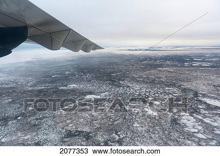 View out the window of a small airplane; churchill manitoba canada View Large Photo Image Stock Image - View out the window of a small airplane; churchill manitoba canada. Fotosearch