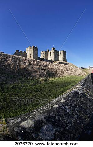 Warkworth castle against a blue sky; warkworth northumberland england View Large Photo Image Stock Image - Warkworth castle against a blue sky; warkworth northumberland england. Fotosearch