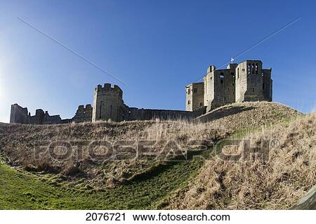 Warkworth castle against a blue sky; warkworth northumberland england View Large Photo Image Stock Image - Warkworth castle against a blue sky; warkworth northumberland england. Fotosearch
