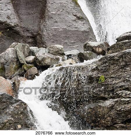 Waterfalls splashing over rocks; hardangervidda norway View Large Photo Image Stock Photograph - Waterfalls splashing over rocks; hardangervidda norway. Fotosearch