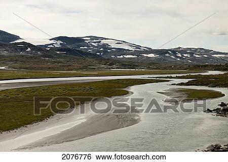 Waterways and snow on the mountains; highlands norway View Large Photo Image Stock Photograph - Waterways and snow on the mountains; highlands norway. Fotosearch