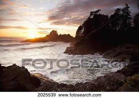 Waves At Cox Bay And Sunset Point At Sunset Near Tofino; British Columbia Canada View Large Photo Image Stock Photo - Waves At Cox Bay And Sunset Point At Sunset Near Tofino; British Columbia Canada. Fotosearch