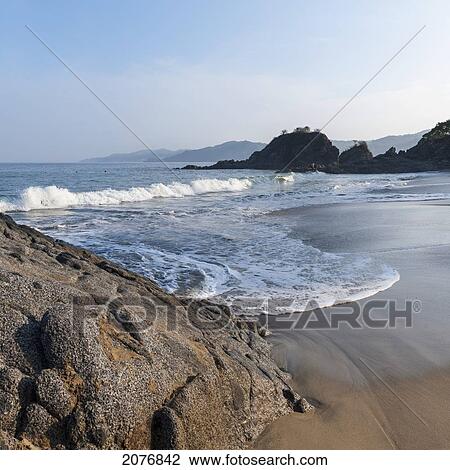 Waves coming into shore onto the wet sand; sayulita mexico View Large Photo Image Stock Image - Waves coming into shore onto the wet sand; sayulita mexico. Fotosearch