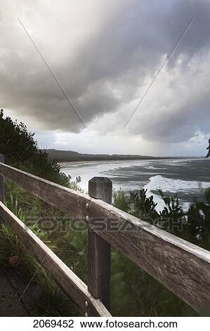 Stock Image - Waves Crashing Into The Beach At Broken Heads; New South Wales Australia. Fotosearch