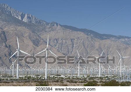 Windmill Farm With Desert Mountain In The Distance And Blue Sky; Palm Springs California United States Of America View Large Photo Image Picture - Windmill Farm With Desert Mountain In The Distance And Blue Sky; Palm Springs California United States Of America. Fotosearch